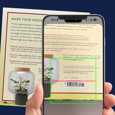 a smartphone scanning the barcode of a book
