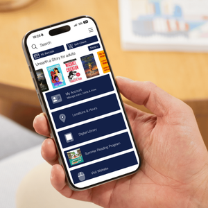 person holding phone with library app on screen